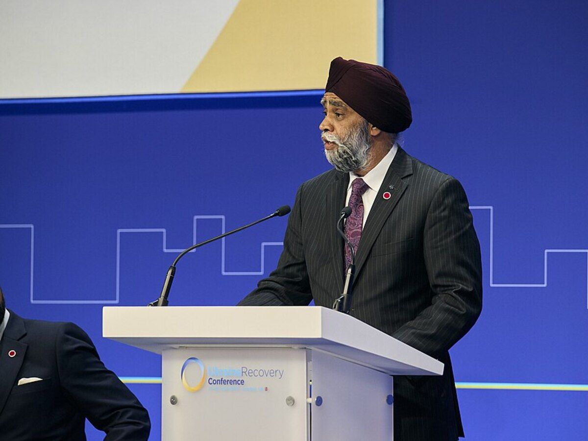 Former minister of national defence Harjit Sajjan speaking at a conference in 2023.