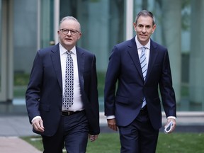 Australian Prime Minister Anthony Albanese and Treasurer Jim Chalmers arrive at Parliament House on May 13 in Canberra, Australia.