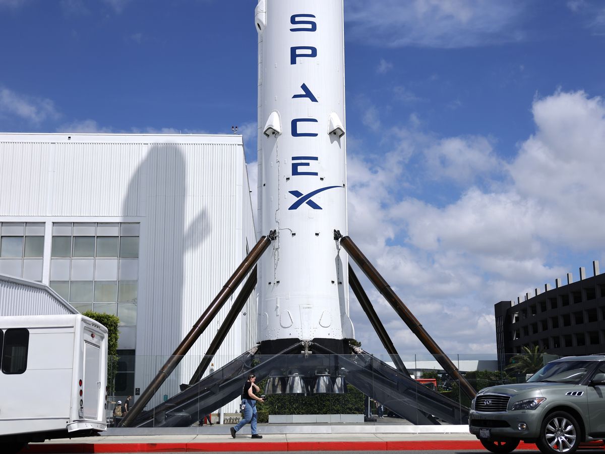 A SpaceX Falcon 9 rocket is displayed at a SpaceX facility in Hawthorne, California.
