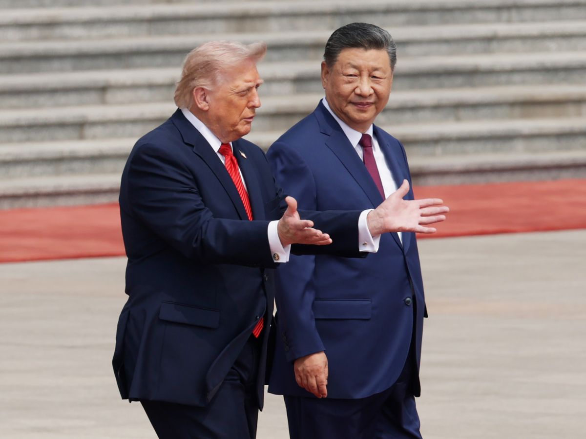 U.S. President Donald Trump and Chinese President Xi Jinping attend a welcome ceremony at the Great Hall of the People on May 14 in Beijing, China.