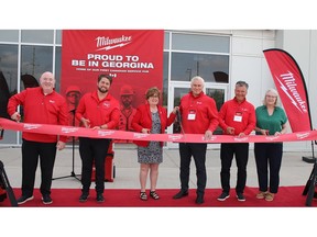 Milwaukee Tool EVP of Quality, Reliability & Service Michael Price, VP of Operations Matthew Waldrop, Town of Georgina Mayor Margaret Quirk, Milwaukee Tool Canada President John Myers, Techtronic Industries Canada Inc. Group President Craig Baxter, and Constituency Assistant to Caroline Mulroney, MPP York-Simcoe, Melody Watson, during the ceremonial ribbon cutting for Milwaukee Tool's first-ever Canadian Service Hub.