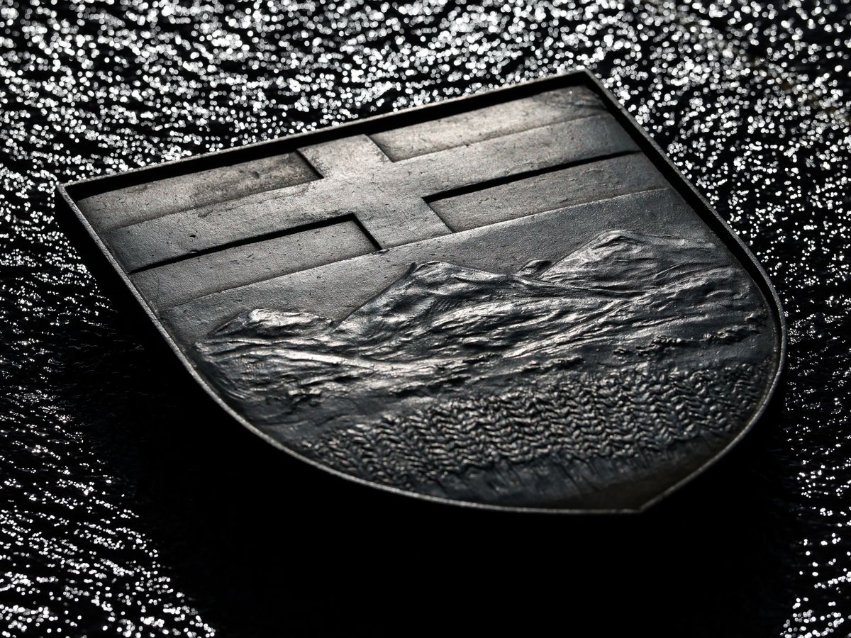 Alberta provincial flag on bronze shield at the Centennial Flame in front of the Centre Block on Parliament Hill in Ottawa on Thursday, June 4, 2026.
