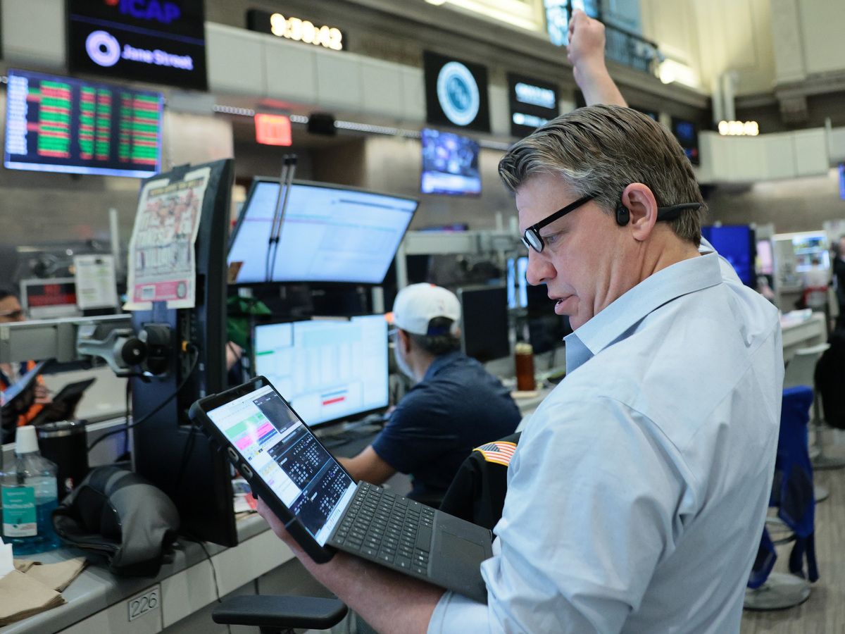 Traders work on the floor of the New York Stock Exchange during morning trading on June 04, 2026 in New York City