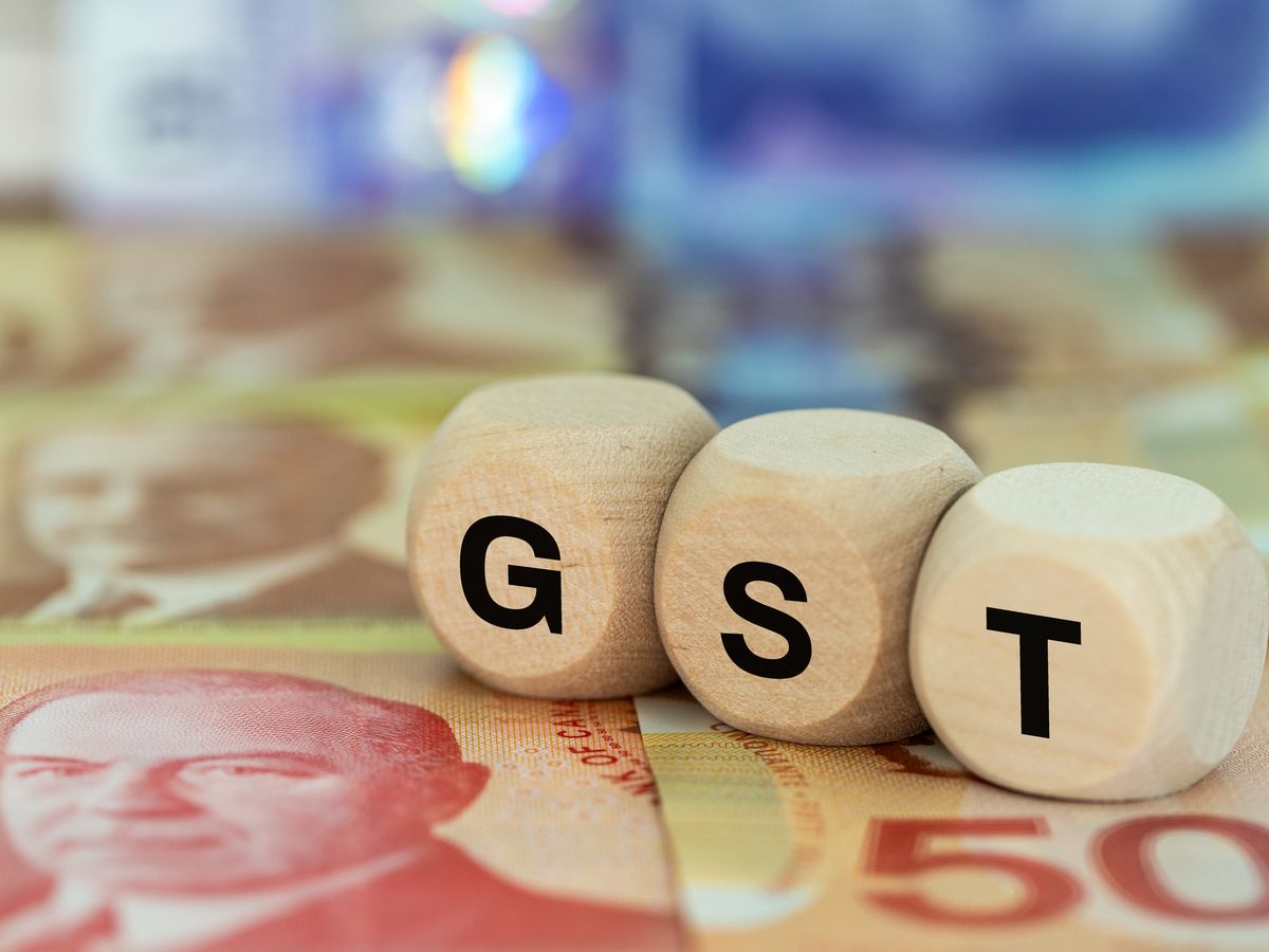 Canadian Goods and Services Tax. GST Canada. Business and financial concept. GST symbol on wooden blocks, Canadian dollar. close up&nbsp; &nbsp;Getty Images