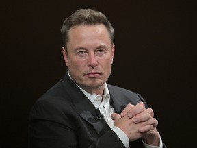 SpaceX, Twitter and electric car maker Tesla CEO Elon Musk looks on as he speaks during his visit at the Vivatech technology startups and innovation fair at the Porte de Versailles exhibition center in Paris, on June 16, 2023.