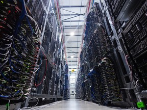 This photograph shows servers inside the data centre of French company OVHcloud in Roubaix, northern France on April 3, 2025.