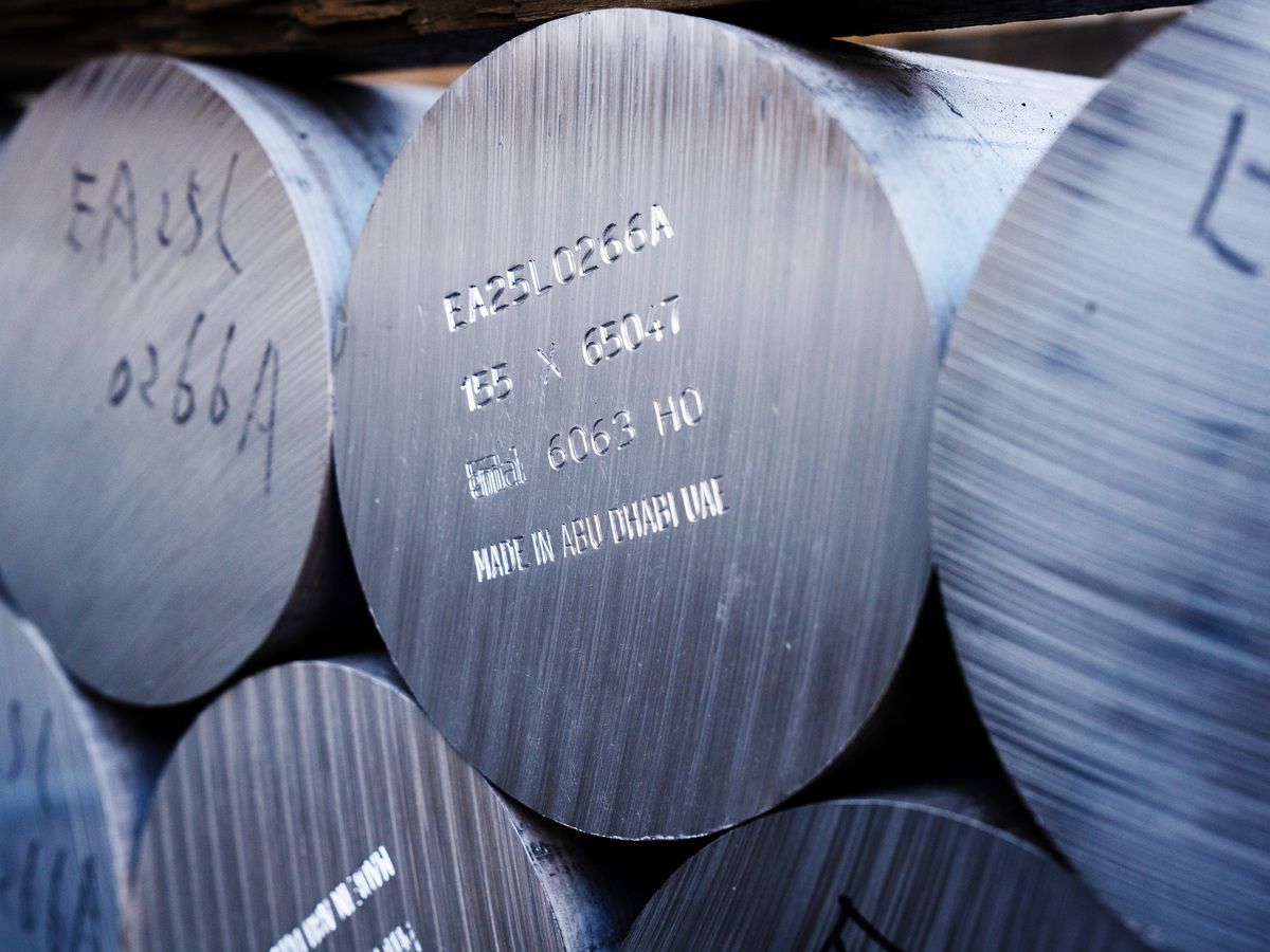Aluminum billets marked "Made in Abu Dhabi UAE" at the Kato Light Metal Industry Co. factory in Kanie, Aichi prefecture, Japan, on Friday, March 27, 2026.