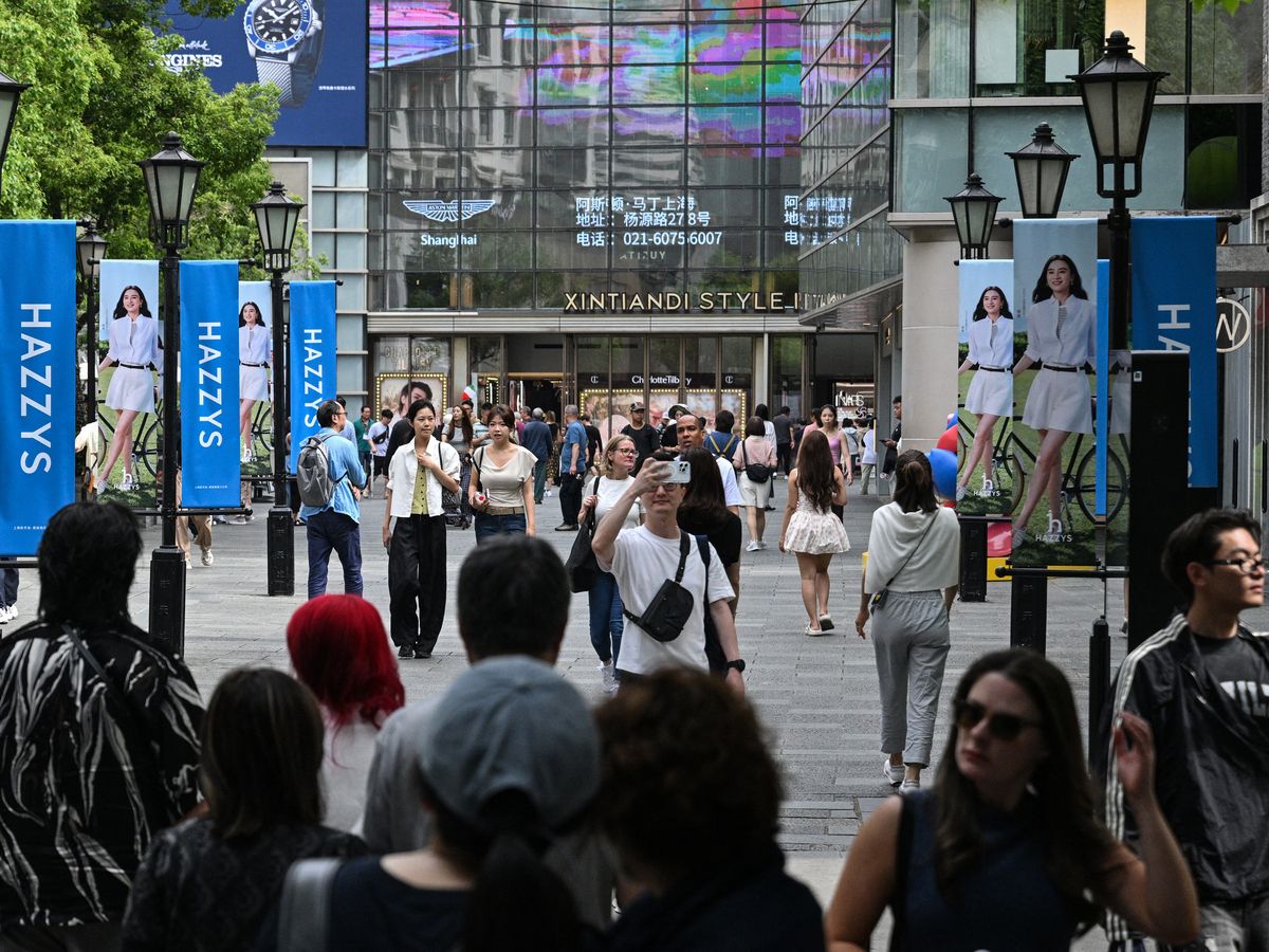 https://smartcdn.gprod.postmedia.digital/financialpost/wp-content/uploads/2026/06/0617-mg-china-shoppers.jpg