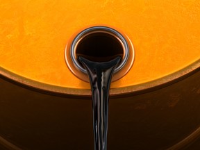Crude oil pouring from a barrel symbolizing record-high fuel prices and supply disruptions