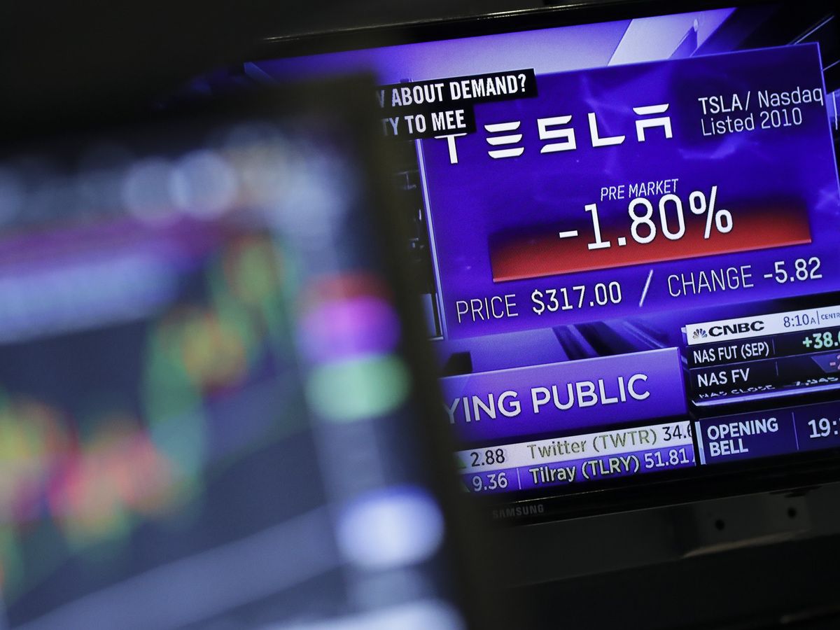 The Tesla logo is displayed on a television broadcast on the floor of the New York Stock Exchange (NYSE), August 27, 2018 in New York City.