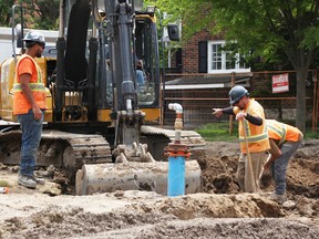 Crews with Henry Heyink Construction work May 20, 2025 on a $2-million sewer separation project at College Avenue North and Essex Street in Sarnia.