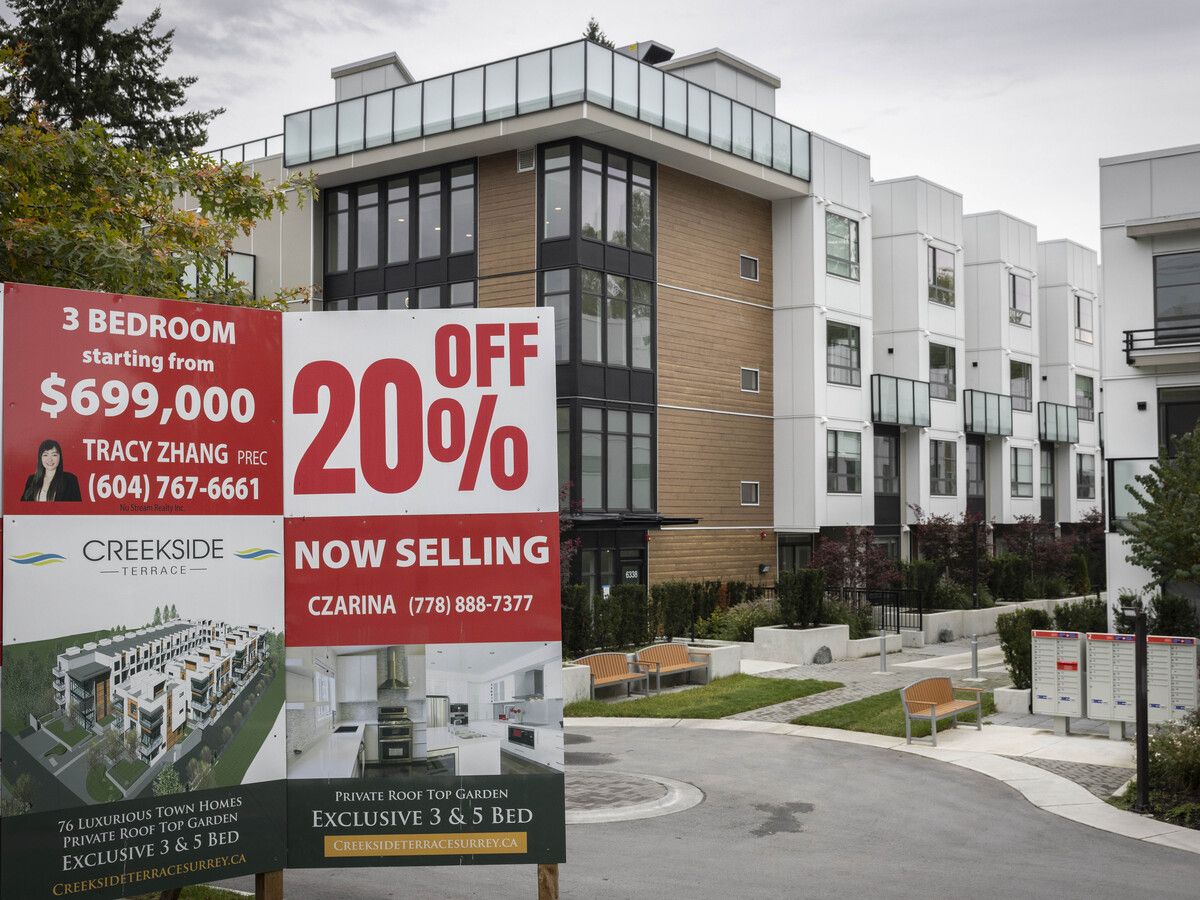 A glut of unsold condos in Surrey, BC have forced developers and retail estate agents to double-down on their efforts to move thousands of vacant stock, as seen at a development on King George Boulevard Wednesday, October 22, 2025.