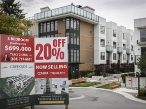 A glut of unsold condos in Surrey, BC have forced developers and retail estate agents to double-down on their efforts to move thousands of vacant stock, as seen at a development on King George Boulevard Wednesday, October 22, 2025.