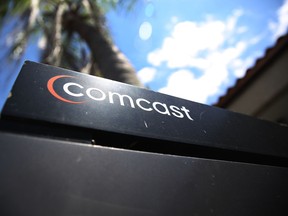A Comcast sign is seen as the U.S. media group submitted a $30.7 billion bid for Sky on April 25, 2018 in Miami, Florida.