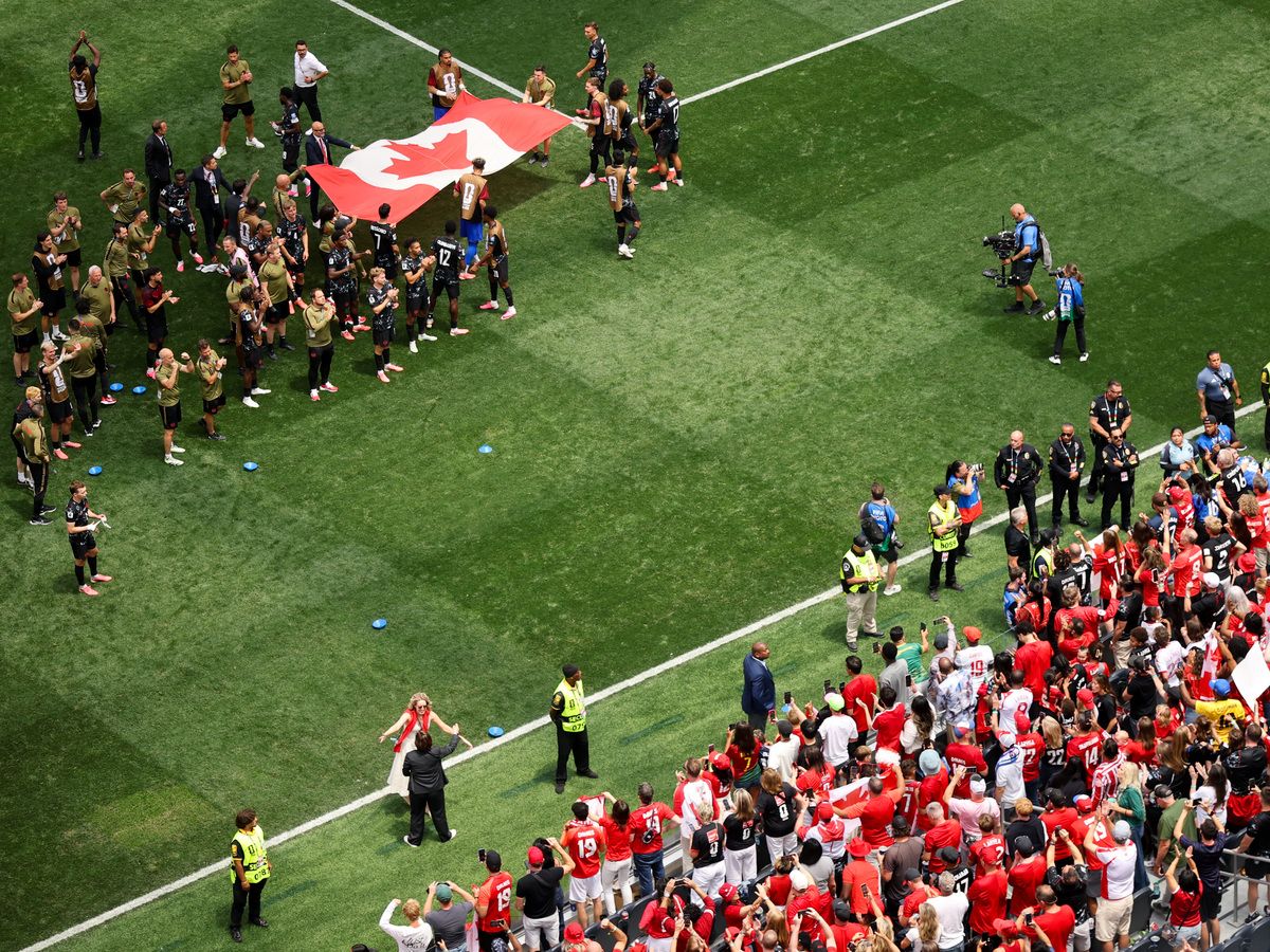 Players of Canada celebrate towards the fans after the team's victory and their side's progression to the Round of 16 after the FIFA World Cup 2026 Round Of 32 match between South Africa and Canada at Los Angeles Stadium on June 28, 2026 in Inglewood, California.