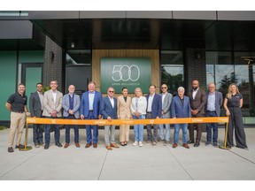Image from ribbon cutting ceremony at 500 Upper Wellington featuring Mayor Andrea Horwath and Councillor Rob Cooper, Ward 8, City of Hamilton, Joseph Mancinelli, Chair of LPFCEC, LiUNA International Vice President and Regional Manager for Central and Eastern Canada, Victoria Mancinelli, members of the LiUNA Board of Trustees, Fengate Asset Management, The Hi-Rise Group, and Ingenuity