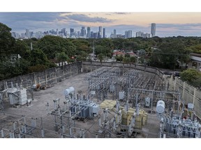High voltage power lines run through a sub-station along the electrical power grid in Miami.