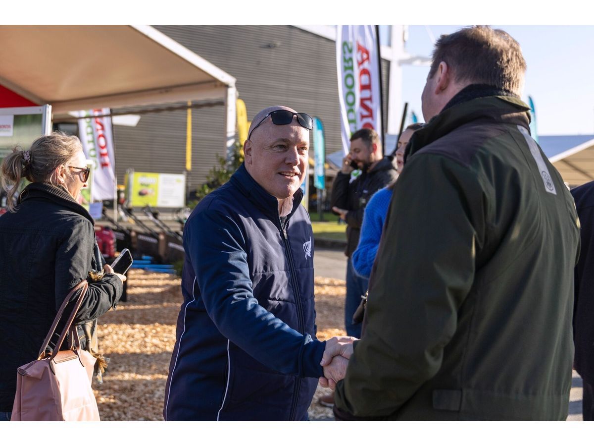 Christopher Luxon, New Zealand's prime minister, greets an attendee at the National Fieldays on June 10.