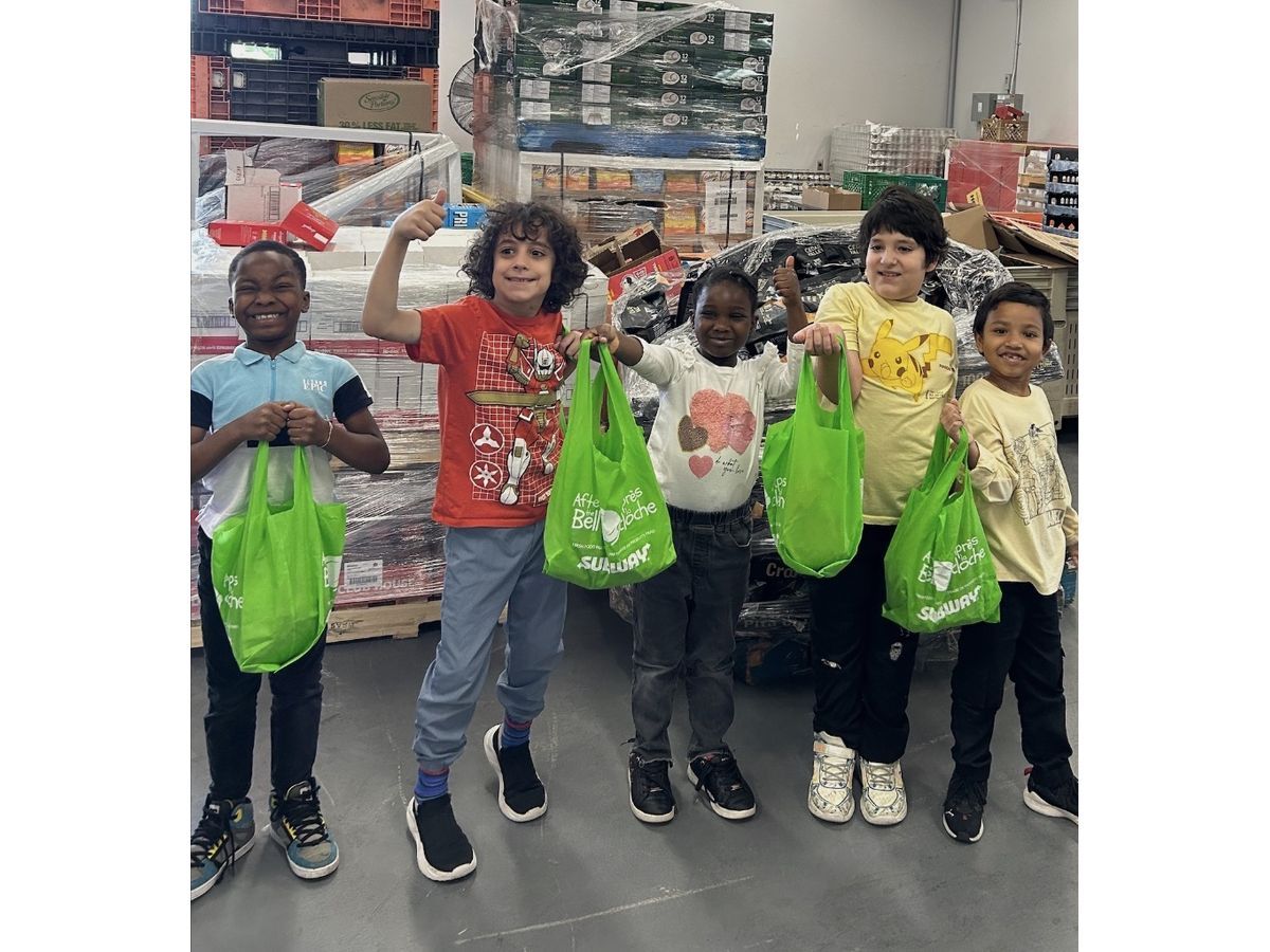 Families and kids receiving food packs at Food Bank Canada locations across the country.