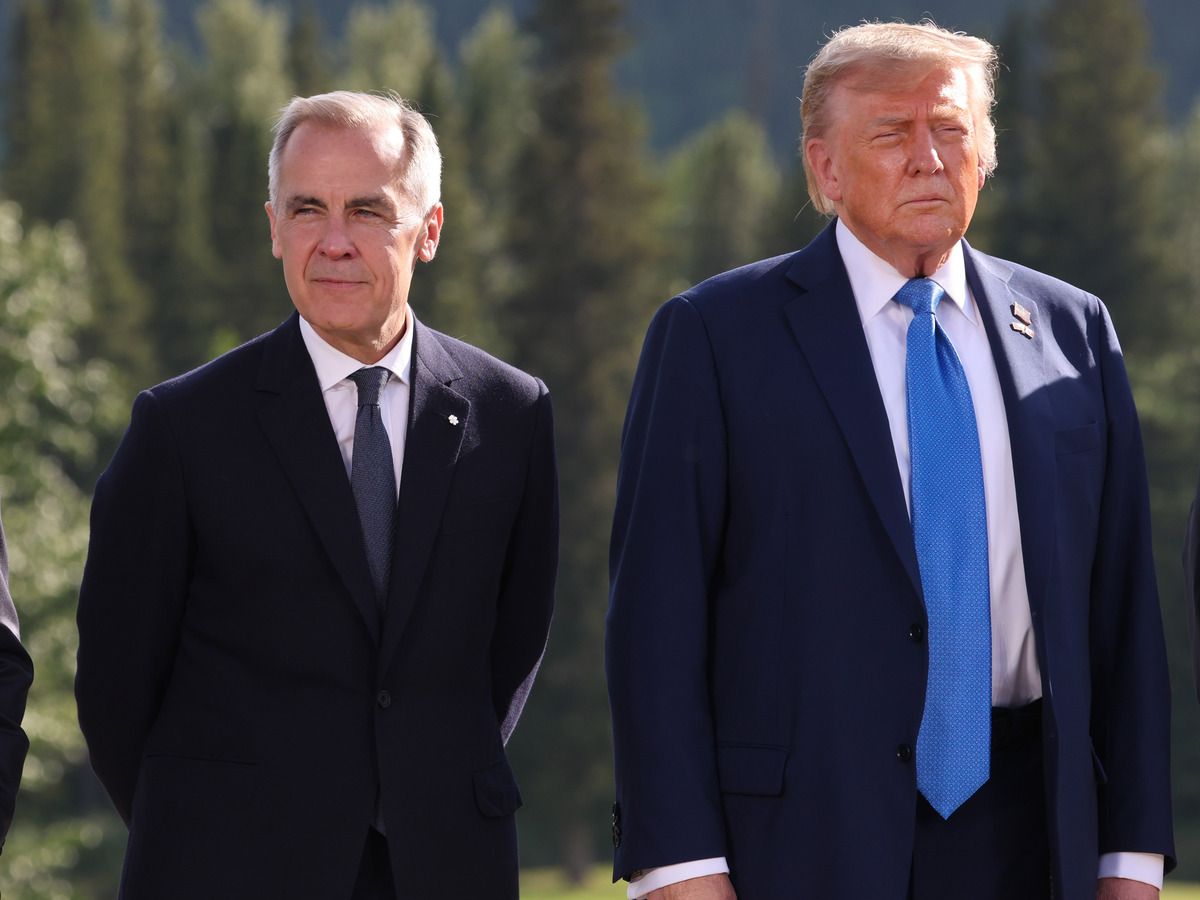 Prime Minister Mark Carney, left, and U.S. President Donald Trump.