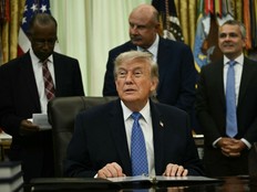 U.S. President Donald Trump takes questions in the Oval Office of the White House, in Washington, D.C. on June 26.