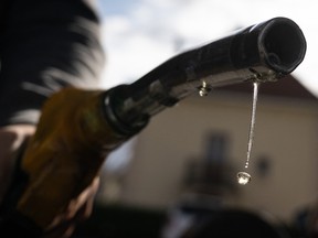 Drops of petrol fall from the nozzle of a petrol pump at a gas station in Mulhouse, eastern France, on April 1, 2026.