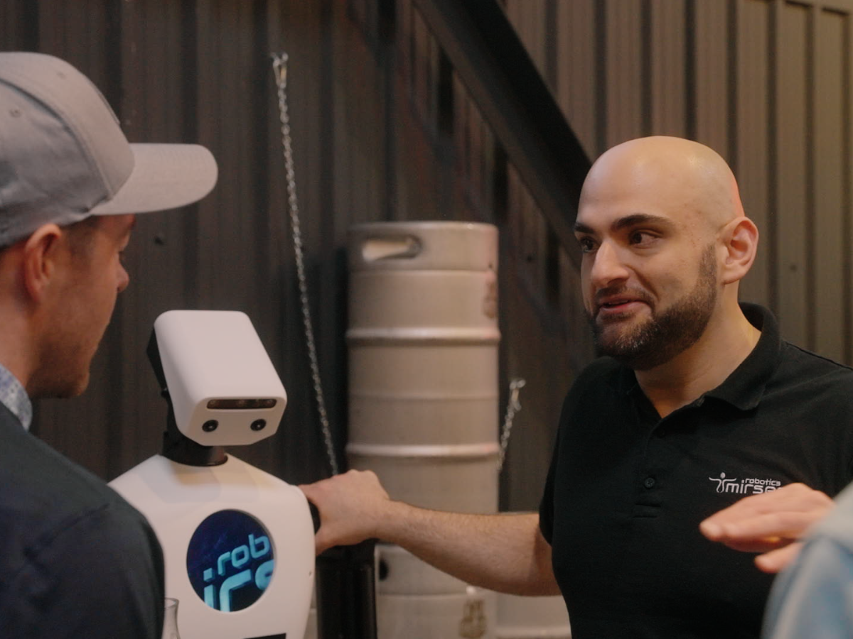 Tarek Rahim, co-founder and chief executive officer of Mirsee Robotics Inc., with the company’s MH3 humanoid robot.