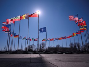 This photograph taken on March 6, 2025 shows the member nation flags in the Cour d'Honneur of the The North Atlantic Treaty Organization (NATO) headquarters in Brussels.