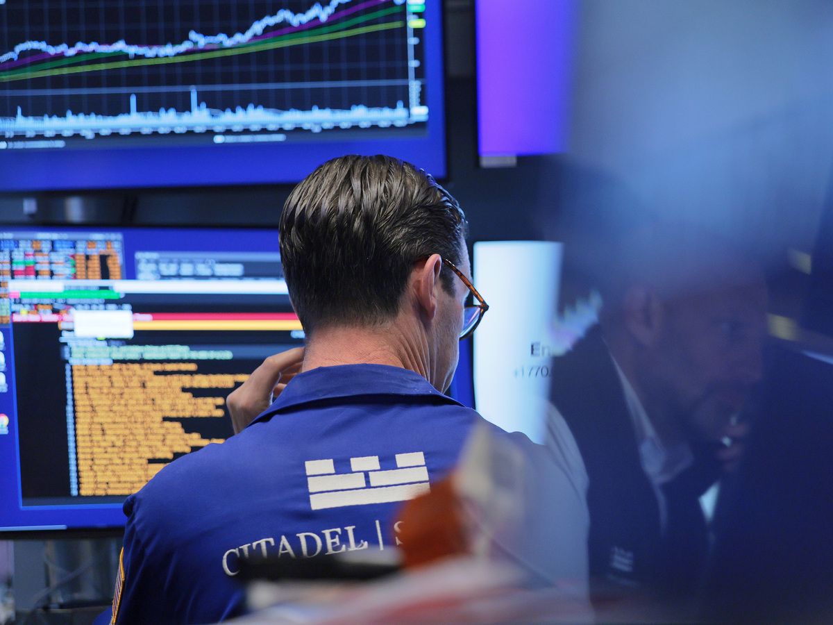 Traders work on the floor of the New York Stock Exchange during morning trading on June 04, 2026 in New York City