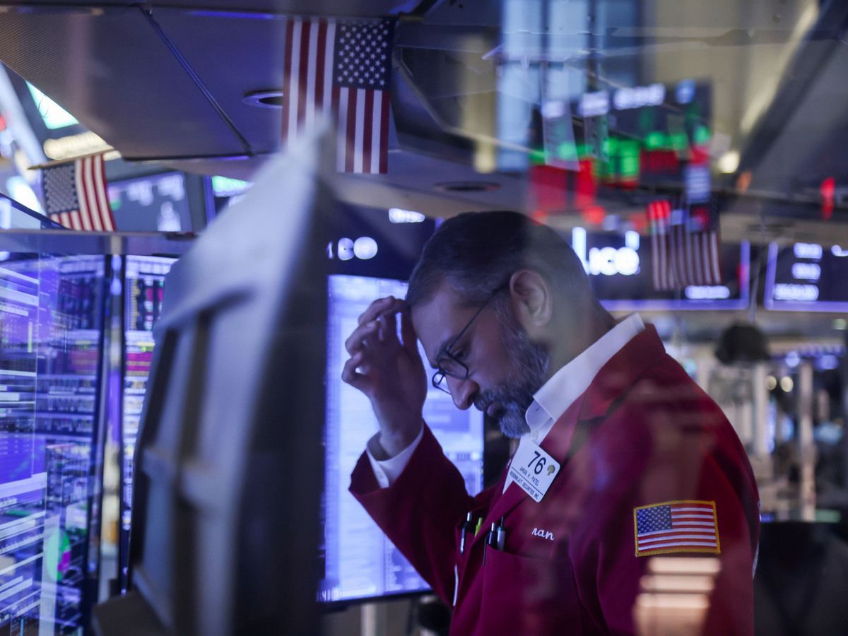 A trader works on the floor of the New York Stock Exchange (NYSE) in New York, U.S., on March 30, 2026.