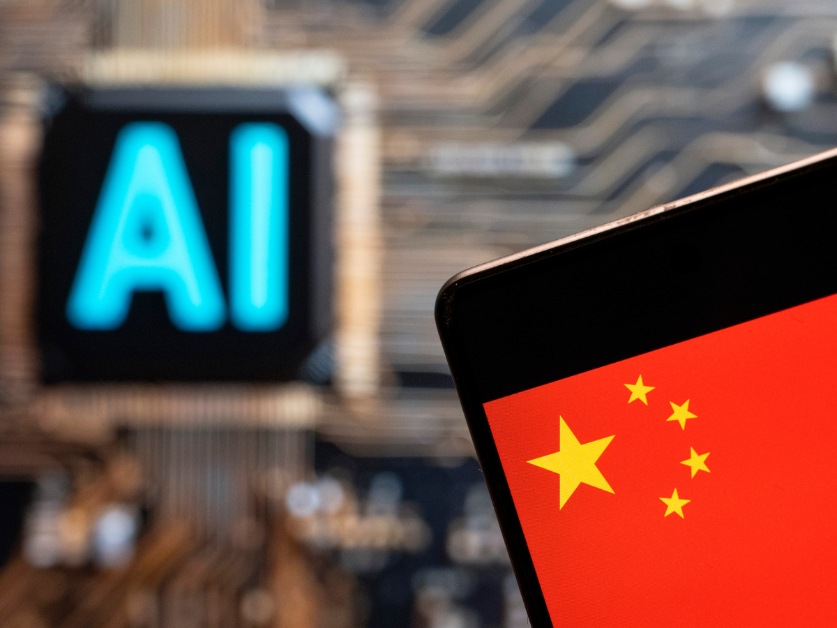 In this photo illustration, the People's Republic of China flag seen displayed on a smartphone with an Artificial intelligence (AI) chip and symbol in the background