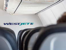 Interior of a Westjet plane. WestJet Airlines Ltd. is a Canadian low-cost carrier that provides scheduled and charter air service to 100 destinations in Canada.