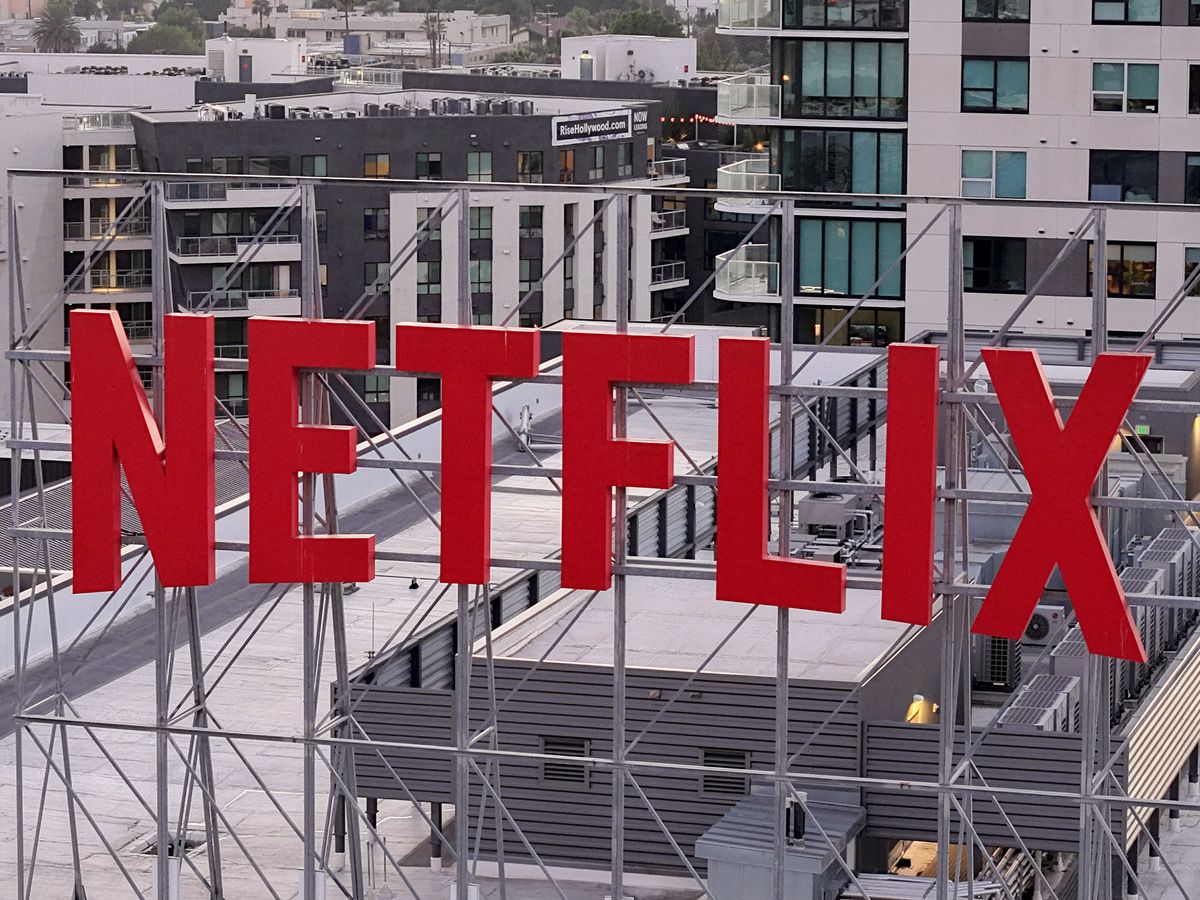 In an aerial view, the Netflix logo is displayed above Netflix corporate offices on October 7, 2025 in Los Angeles, California.