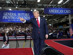 U.S. President Donald Trump greets supporters after speaking at General Motors’ Milford Proving Grounds on July 27, 2026 in Milford, Michigan.
