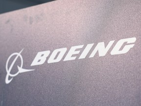 The logo for US plane maker Boeing is pictured on the second day of the Farnborough International Airshow 2026 in Farnborough, south-west of London, on July 21, 2026.