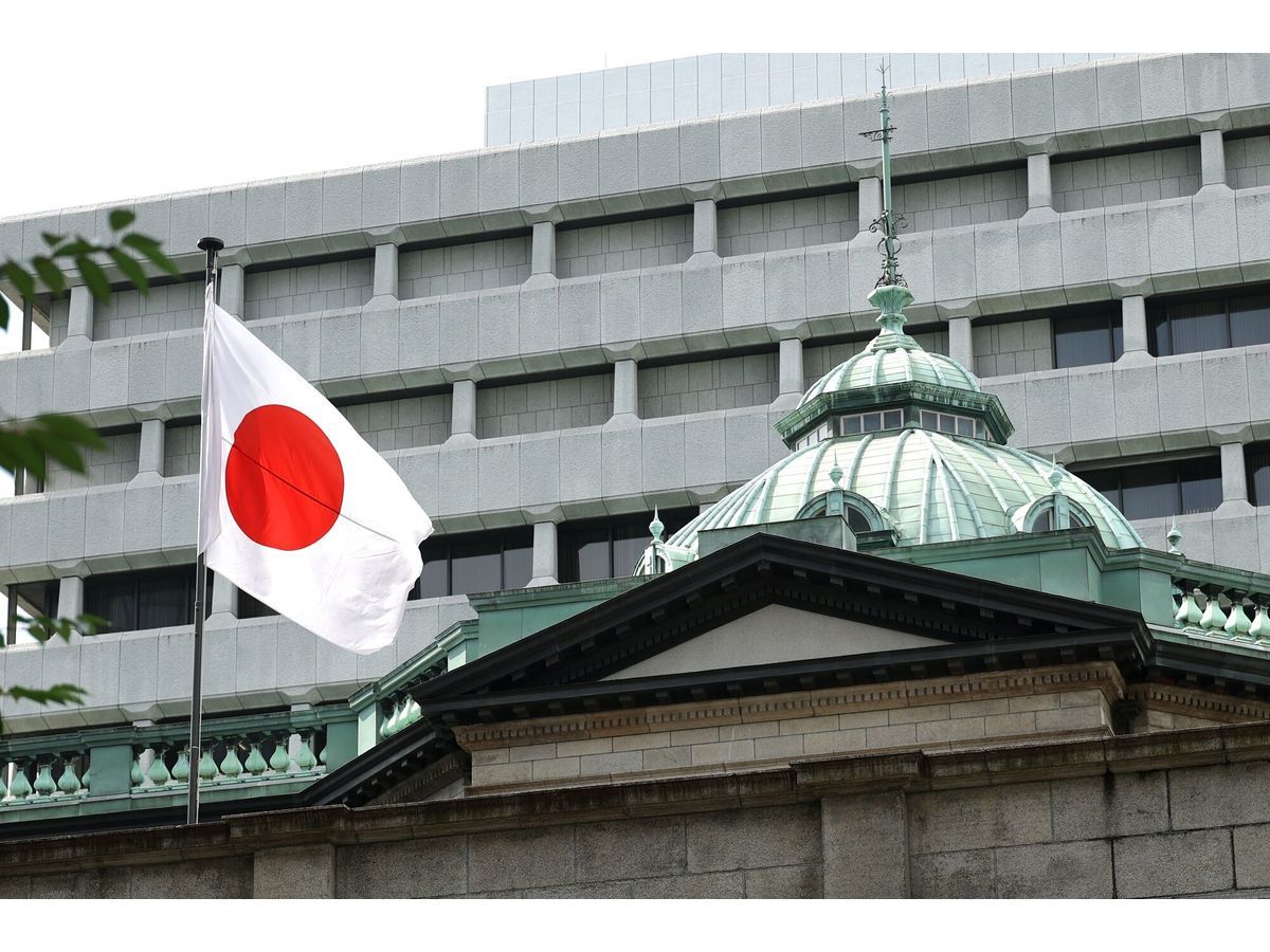 A Japanese flag at the Bank of Japan (BOJ) headquarters in Tokyo, Japan, on Tuesday, June 30, 2026. New BOJ Board Member Ayano Sato said the country's inflation views aren't very strong yet, suggesting her tilt toward accommodative policy as an appointee of Prime Minister Sanae Takaichi.