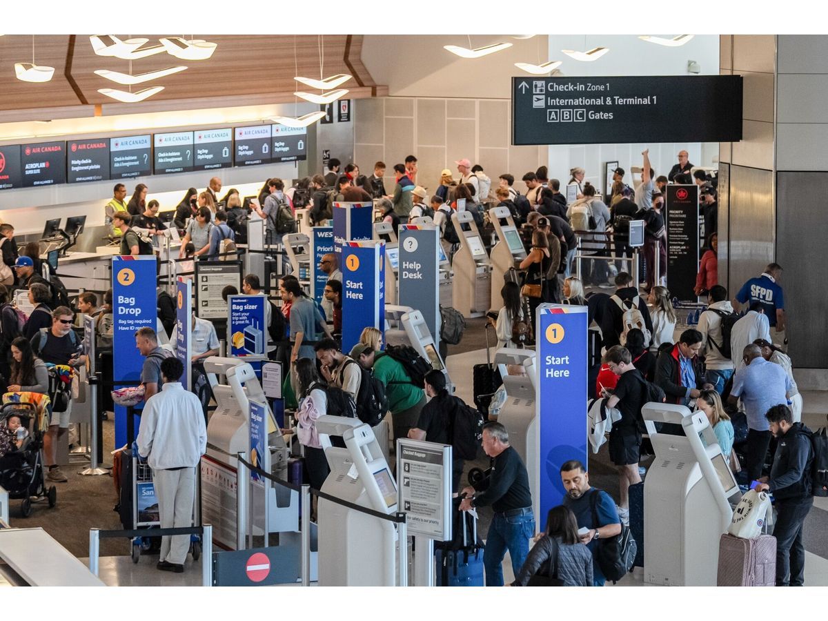 Southwest Airlines passengers checking in at San Francisco International Airport in July. Airlines are turning to AI to make their dynamic pricing methods more efficient.