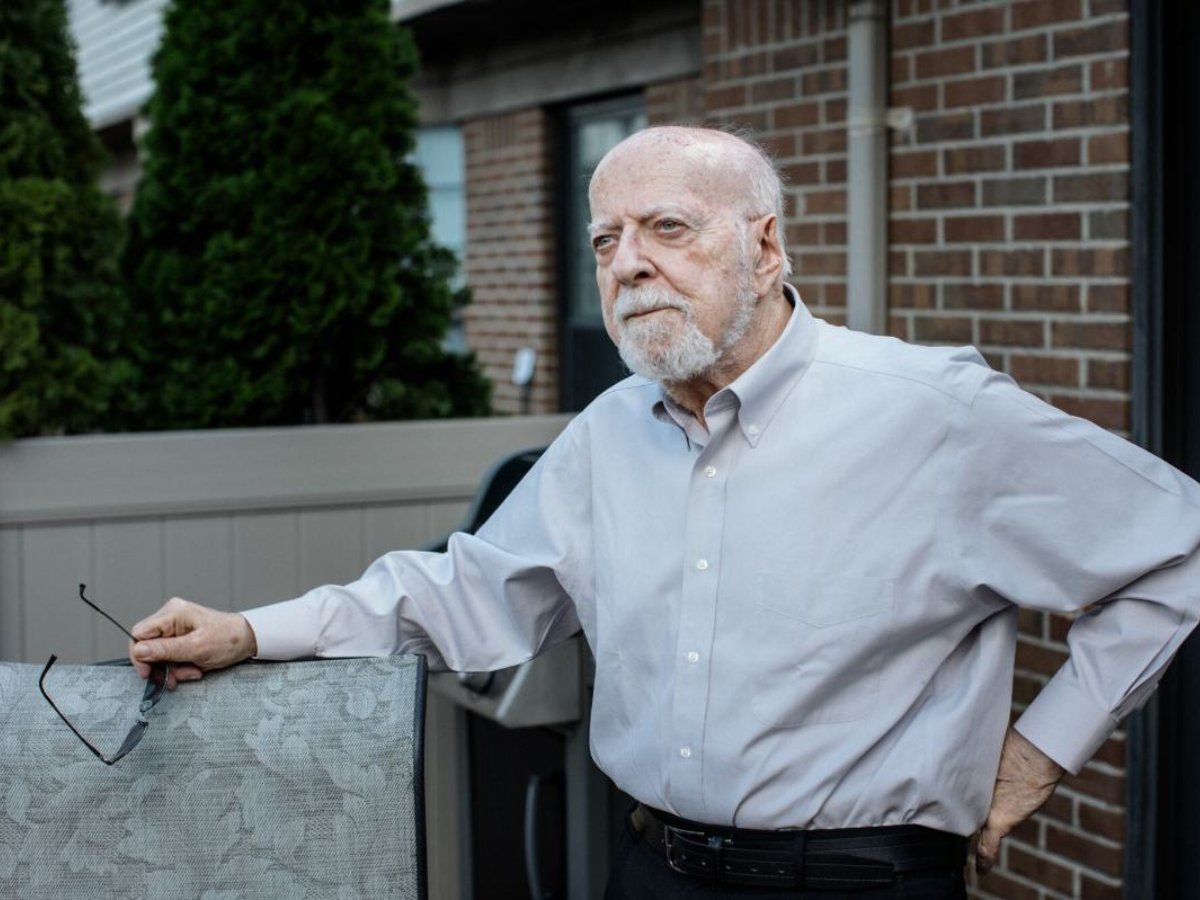 Jack Lifton, 86, a rare earth consultant, poses for a portrait outside his home in Farmington Hills, MI on June 19, 2026.