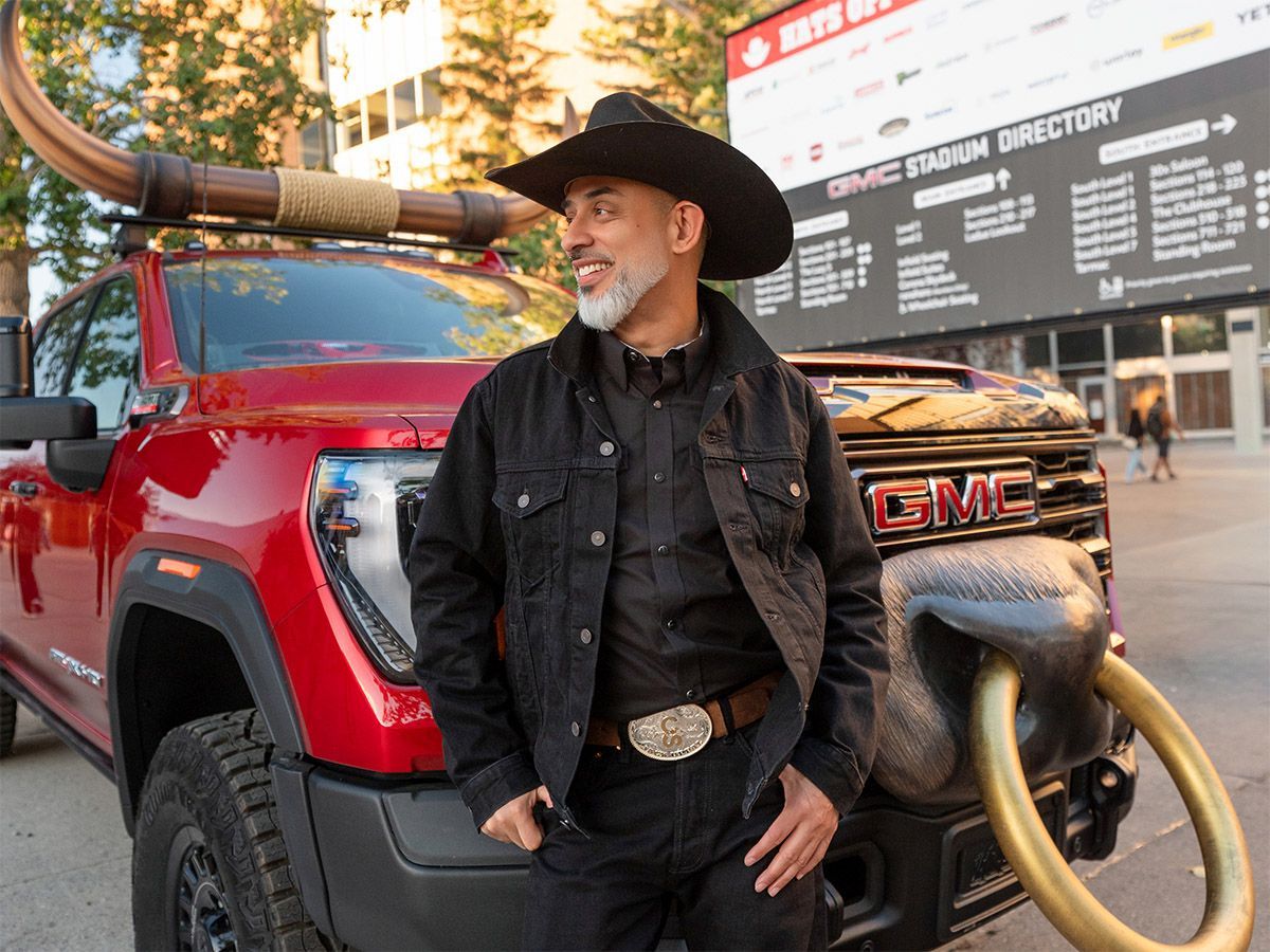 General Motors Canada president Jack Uppal poses in western attire during the Calgary Stampede. While he began in his current role in February, Uppal has been with GM for more than 26 years.