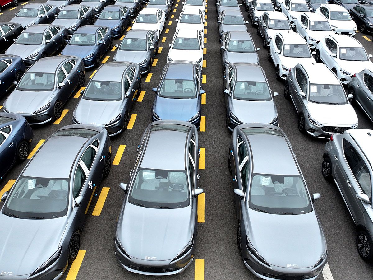 BYD and MG cars, from Chinese automakers, are seen at Lianyungang Port in Jiangsu province, eastern China, ready to be loaded onto ships for export this month.