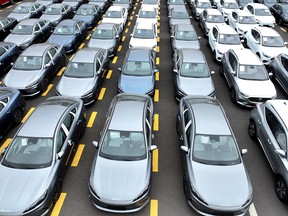 BYD and MG cars, from Chinese automakers, are seen at Lianyungang Port in Jiangsu province, eastern China, ready to be loaded onto ships for export this month.
