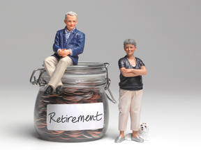 Retired couple with retirement savings jar
