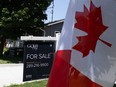 Real estate home for sale signage on Beach Boulevard in Hamilton, Ontario on Wednesday, July 8, 2026.