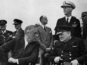 American president Franklin Delano Roosevelt (1882 - 1945) meets British prime minister Winston Churchill (1874 - 1965) for a church service on board the HMS Prince of Wales in Placentia Bay, Newfoundland, August 1941.