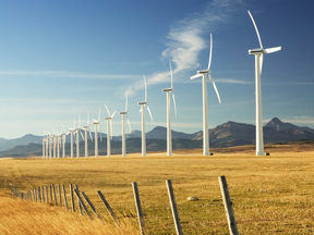 Row of wind turbines on wind farm in Row of wind turbines on wind farm, autumn - stock photo Crowsnest Pass area, Alberta.