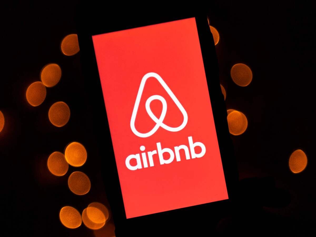 This illustration picture taken on November 22, 2019, shows the logo of the online lodging service Airbnb displayed on a smartphone in Paris.