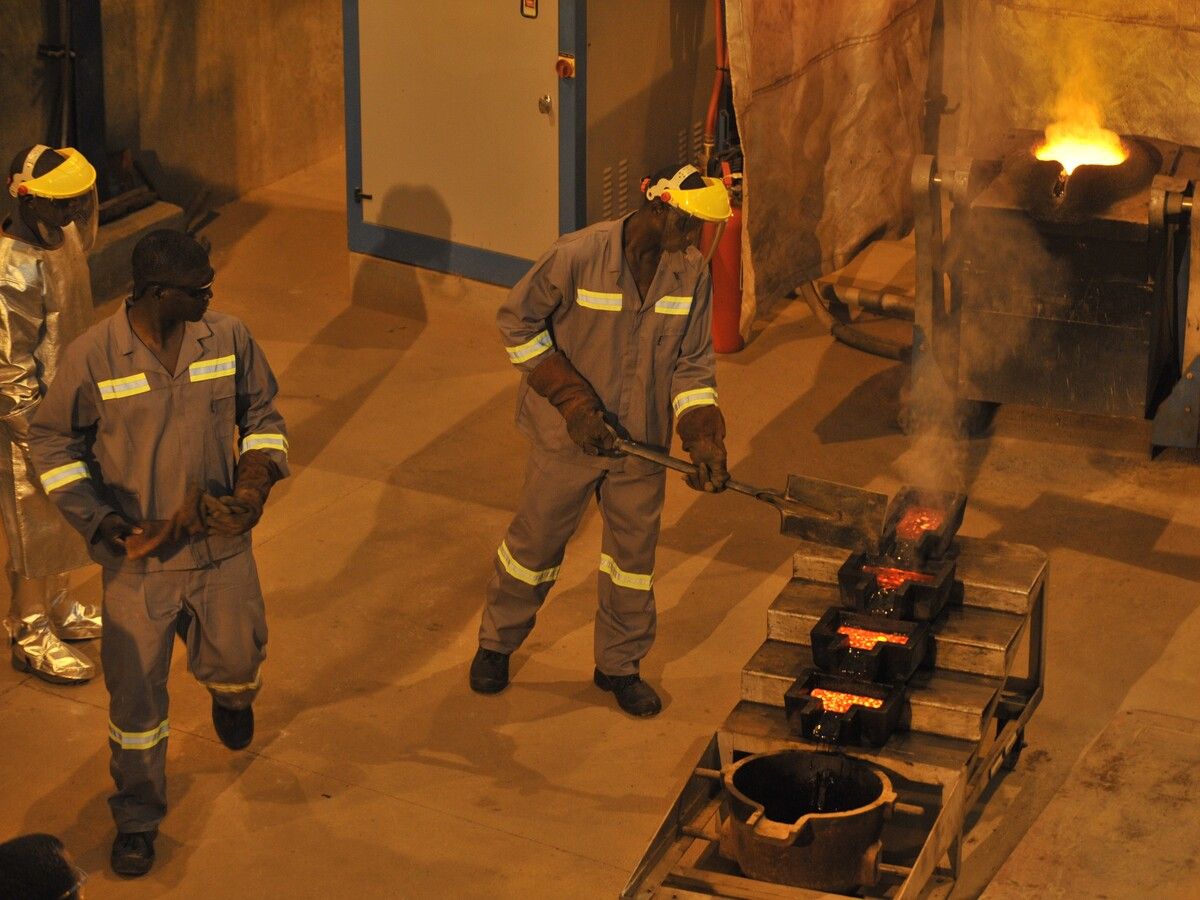 Workers work on a site of the Tongon gold mine operated by South African company on October 24, 2011 in Tongon, northern Ivory Coast.