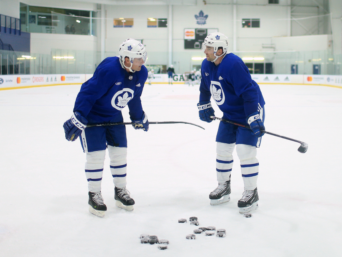 Former Toronto Maple Leaf Patrick Marleau and still-current Toronto Maple Leafs John Tavares work together after practise at the Leafs practice facility in Toronto on Monday.