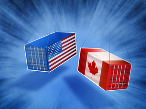 Canadian and american Cargo Container hanging illustrating the economic warfare and trade war