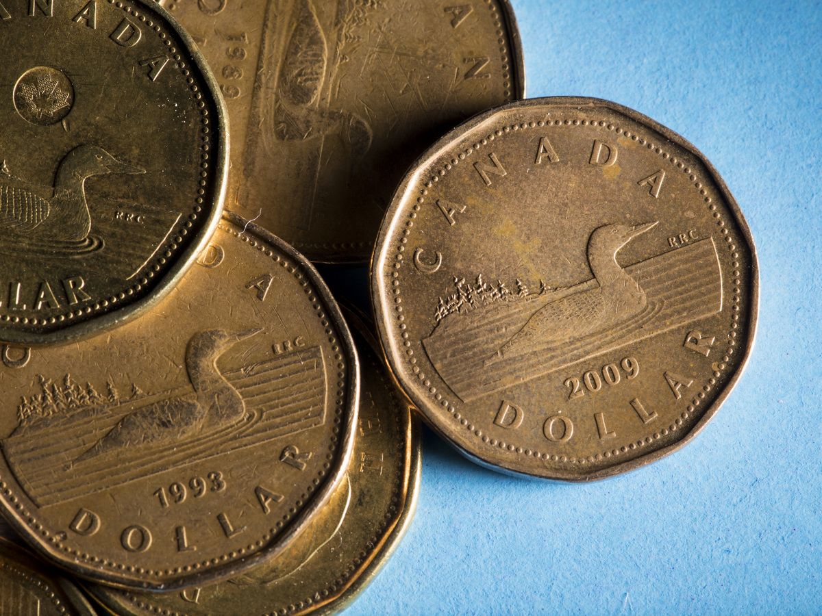 Canadian one dollar coins, also known as Loonies, are arranged for a photograph in Toronto, Ontario, Canada, on Wednesday, July 25, 2018.